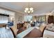 Open dining area with view of the living room and kitchen at 205 Silver Falls Dr, Apollo Beach, FL 33572