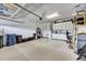 Organized garage with built-in cabinets at 205 Silver Falls Dr, Apollo Beach, FL 33572