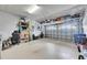 Garage with overhead storage and workshop area at 205 Silver Falls Dr, Apollo Beach, FL 33572