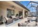 Peaceful screened patio with outdoor furniture at 205 Silver Falls Dr, Apollo Beach, FL 33572