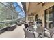 Enjoyable screened patio with comfortable seating at 205 Silver Falls Dr, Apollo Beach, FL 33572