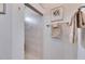 Clean shower with tiled walls and built-in shelving at 205 Silver Falls Dr, Apollo Beach, FL 33572