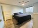 Spacious bedroom with light walls, new flooring, and a large dresser at 2067 Hunters Glen Dr # 313, Dunedin, FL 34698