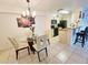 Kitchen with granite counters and black appliances at 2067 Hunters Glen Dr # 313, Dunedin, FL 34698