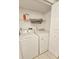 Bright laundry room with washer and dryer at 2067 Hunters Glen Dr # 313, Dunedin, FL 34698