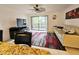 Living room with sofa, TV, and sliding glass doors at 2067 Hunters Glen Dr # 313, Dunedin, FL 34698