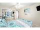 Bedroom with mirrored closet and queen bed at 2406 Gulf Blvd # 204, Indian Rocks Beach, FL 33785
