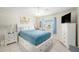 Comfortable bedroom with a queen-size bed and plenty of storage at 2406 Gulf Blvd # 204, Indian Rocks Beach, FL 33785