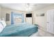 Bright bedroom with a queen bed and ocean views at 2406 Gulf Blvd # 204, Indian Rocks Beach, FL 33785