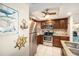 Kitchen features stainless steel appliances and granite counters at 2406 Gulf Blvd # 204, Indian Rocks Beach, FL 33785