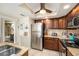 Well-equipped kitchen with stainless steel appliances at 2406 Gulf Blvd # 204, Indian Rocks Beach, FL 33785
