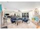 Open living space with tile floors and fireplace at 2406 Gulf Blvd # 204, Indian Rocks Beach, FL 33785