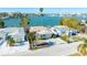 Aerial showing home's location on the waterfront at 256 145Th E Ave, Madeira Beach, FL 33708