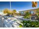 Waterfront backyard with patio and lush vegetation at 256 145Th E Ave, Madeira Beach, FL 33708