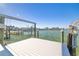 Nice dock with lift and water access; enjoy boating lifestyle at 256 145Th E Ave, Madeira Beach, FL 33708