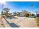 Single-story home with spacious front yard at 256 145Th E Ave, Madeira Beach, FL 33708