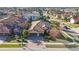 House with two car garage, nicely landscaped lawn at 2564 Grand Cypress Blvd, Palm Harbor, FL 34684