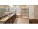 Spa-like bathroom with soaking tub and walk-in shower at 2564 Grand Cypress Blvd, Palm Harbor, FL 34684