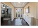 Bright and spacious entryway with wood floors at 2564 Grand Cypress Blvd, Palm Harbor, FL 34684