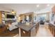 Open concept kitchen with island, granite countertops, and stainless steel appliances at 2564 Grand Cypress Blvd, Palm Harbor, FL 34684