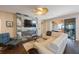 Relaxing living room with modern fireplace and access to backyard patio at 2564 Grand Cypress Blvd, Palm Harbor, FL 34684