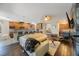 Living room with open concept kitchen and fireplace at 2564 Grand Cypress Blvd, Palm Harbor, FL 34684