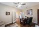 Home office with built-in shelving and hardwood floors at 2564 Grand Cypress Blvd, Palm Harbor, FL 34684