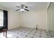 Bright bedroom with mirrored closet doors and a ceiling fan at 3123 W Rio Vista Ave, Tampa, FL 33614