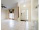 Bright and spacious entryway with tile flooring and an arched doorway at 3123 W Rio Vista Ave, Tampa, FL 33614