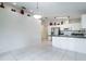 Modern kitchen with stainless steel appliances and a breakfast bar at 3123 W Rio Vista Ave, Tampa, FL 33614