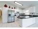 Modern kitchen with stainless steel appliances and an island at 3123 W Rio Vista Ave, Tampa, FL 33614