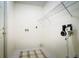Laundry room with wire shelving and space for a washer and dryer at 3123 W Rio Vista Ave, Tampa, FL 33614
