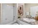 Bathroom with granite vanity and shower/tub combo at 32443 Osprey Peak Way, San Antonio, FL 33576