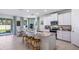 Eat-in kitchen with granite countertops and stainless steel appliances at 32443 Osprey Peak Way, San Antonio, FL 33576