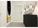 Bright entryway with a console table and statement art at 35233 Gravelly Dr, Zephyrhills, FL 33541