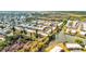 Wide aerial view of community and surrounding area at 4231 Tamargo Dr # 3, New Port Richey, FL 34652