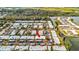 Aerial view showing a condo building near a waterway, ample parking and landscaping at 4231 Tamargo Dr # 3, New Port Richey, FL 34652