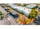 Aerial view of condo building with parking and landscaping at 4231 Tamargo Dr # 3, New Port Richey, FL 34652