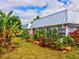 Exterior view showing the building and surrounding landscape at 4231 Tamargo Dr # 3, New Port Richey, FL 34652