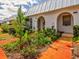 House exterior showcasing landscaping and walkway at 4231 Tamargo Dr # 3, New Port Richey, FL 34652