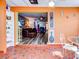 Sunroom features terracotta tile floors and a ceiling fan at 4231 Tamargo Dr # 3, New Port Richey, FL 34652