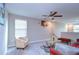 Bright living area with seating, coffee table, and natural light at 4526 Eternal Prince Dr, Sun City Center, FL 33573