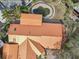 Aerial view features home's unique copper colored roof, inground pool and beautiful landscape at 4829 W San Miguel St, Tampa, FL 33629