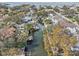 This is an aerial view of a canal highlighting the homes and boat docks along its waterway at 4829 W San Miguel St, Tampa, FL 33629