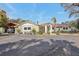 Charming single-story home with lush landscaping and a paved driveway at 4829 W San Miguel St, Tampa, FL 33629