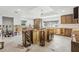 Bright kitchen with large windows, custom cabinets and a large center island at 4829 W San Miguel St, Tampa, FL 33629