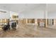 Large living room with wood floors and views into the kitchen at 4829 W San Miguel St, Tampa, FL 33629