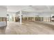 Open-concept living room with light tile flooring, ready for renovation and customization at 4829 W San Miguel St, Tampa, FL 33629