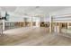Open-concept living room boasts tile floors, high ceilings, and modern lighting at 4829 W San Miguel St, Tampa, FL 33629
