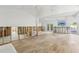 Expansive living area with light tile, offering a bright canvas for personalization and design at 4829 W San Miguel St, Tampa, FL 33629